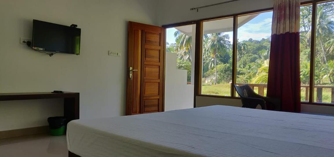 Hotel Exotica Squares Lakshmanpur Bagian luar foto