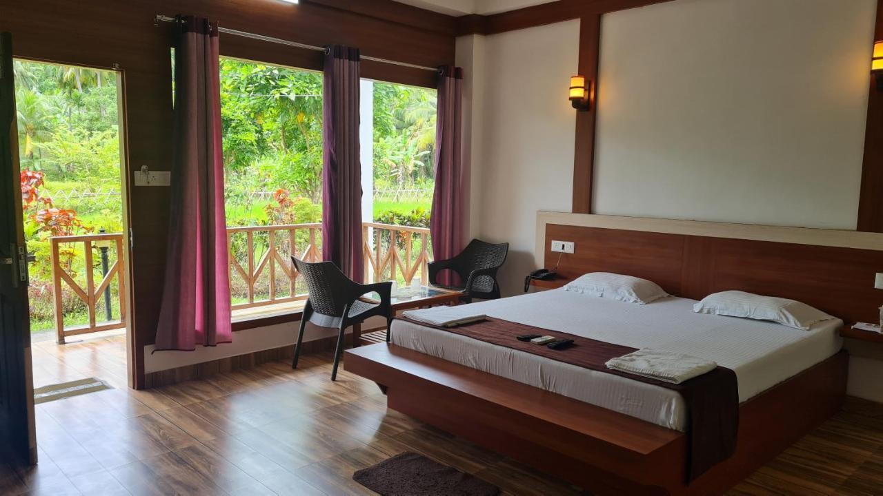 Hotel Exotica Squares Lakshmanpur Bagian luar foto