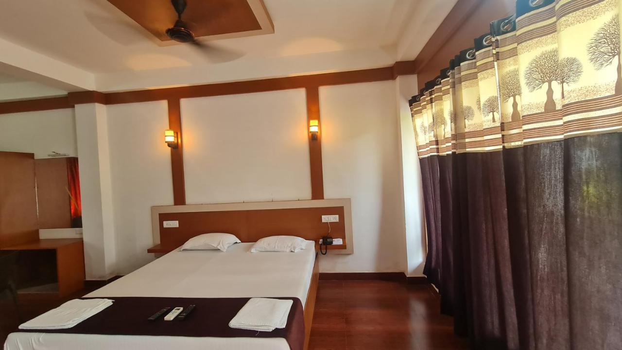 Hotel Exotica Squares Lakshmanpur Bagian luar foto