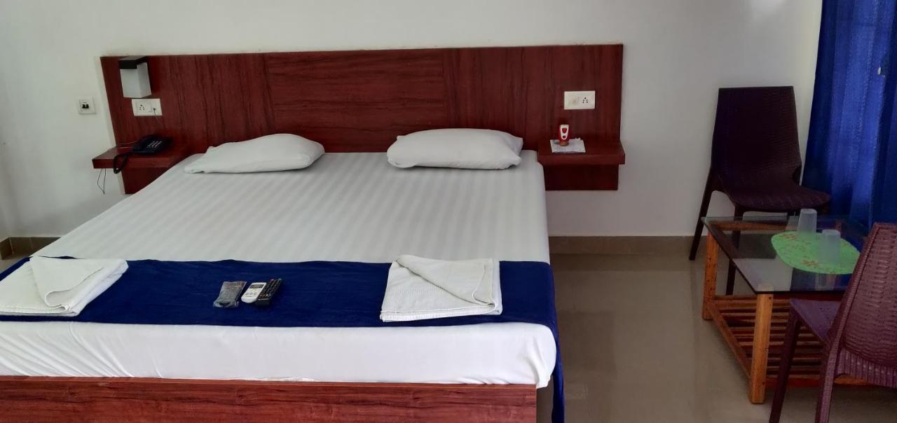 Hotel Exotica Squares Lakshmanpur Bagian luar foto