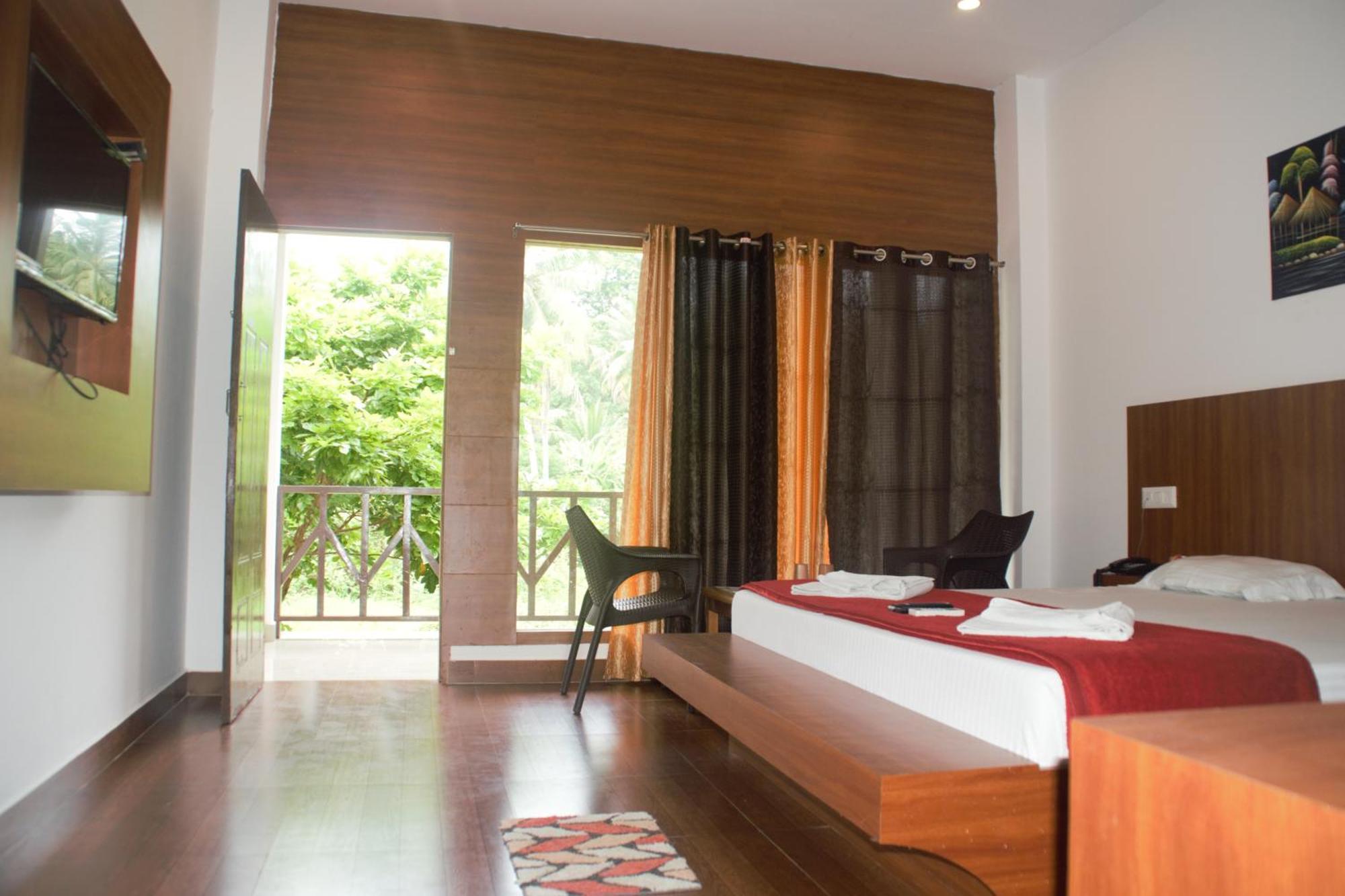 Hotel Exotica Squares Lakshmanpur Bagian luar foto